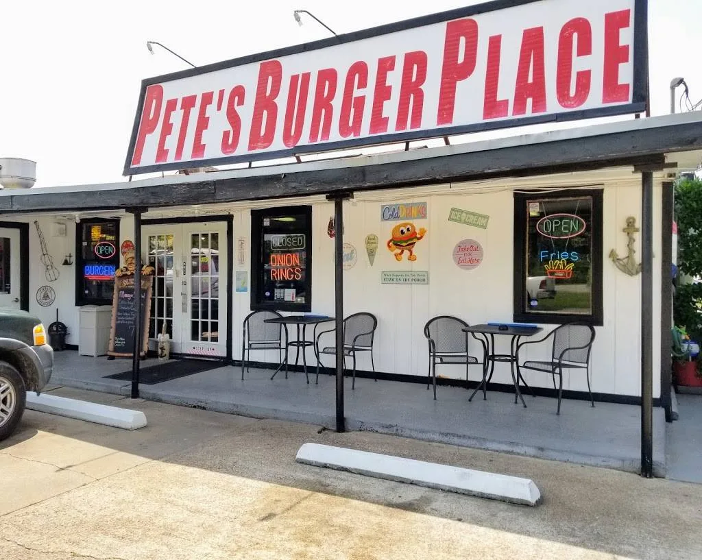 The full Pete’s Burger Place sign above the front porch on Loop 494