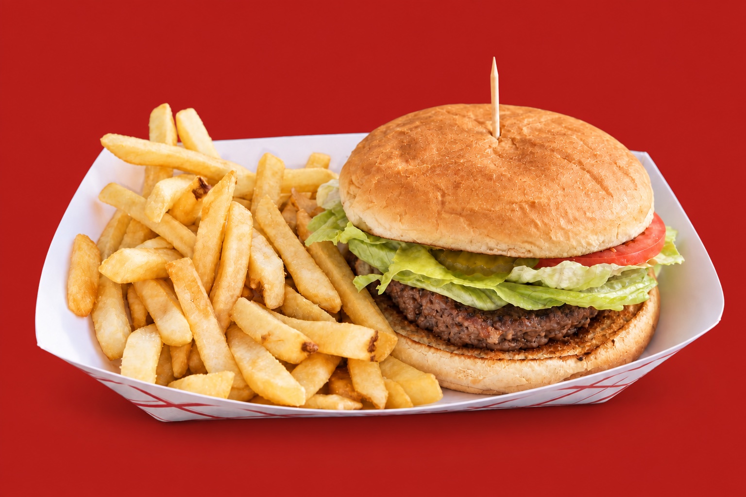 Placeholder hamburger and fries in a red-patterned paper tray; actual food may differ